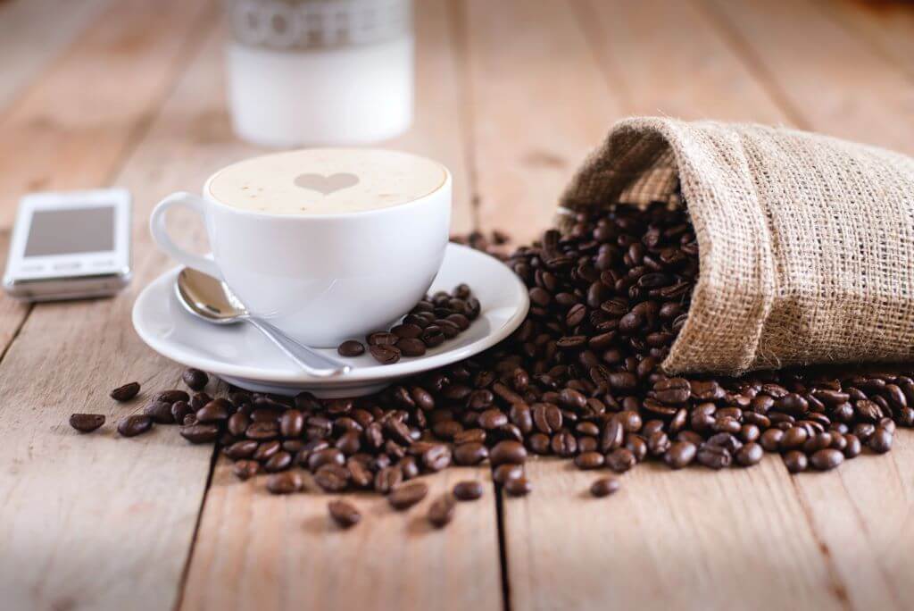 Coffee money: Espresso with coffee beans